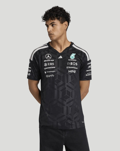 Black Mercedes AMG Petronas driver T shirt with team sponsor logos across the chest and white shoulder stripes.