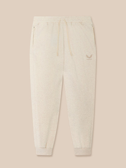 Cream Men's Adapt Cotton Fleece joggers with elastic waistband drawcord, zip pockets and Castore logo on the thigh.