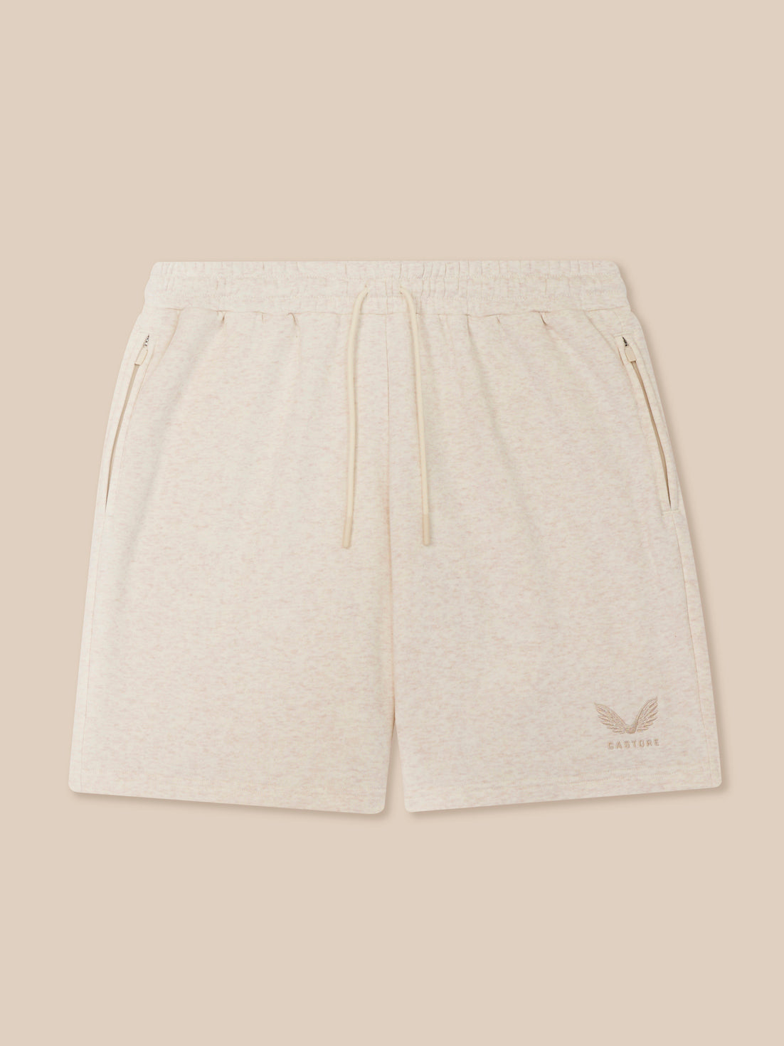 Cream Men's Adapt Cotton Fleece shorts with elastic waistband drawcord, zip pockets and Castore logo on the leg.