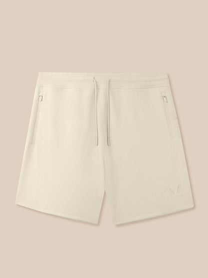 Cream Men’s Flex Shorts with adjustable drawcord waistband zip pockets and Castore logo on left thigh