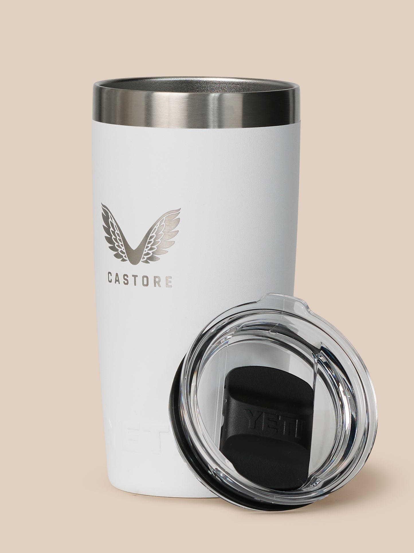 White YETI Castore tumbler showing the large YETI logo embossed on the lower body.