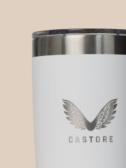 Close-up of YETI x Castore 300ml tumbler rim showing a brushed stainless band on a white body with partial Castore logo