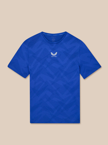 Blue t-shirt with a logo on a beige background