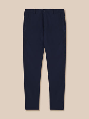 Navy men's golf trousers back view showing rear pockets and Castore branding