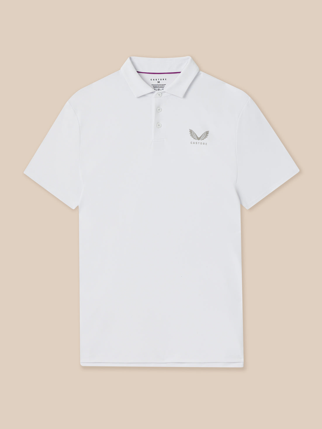 White polo shirt with a logo on a beige background