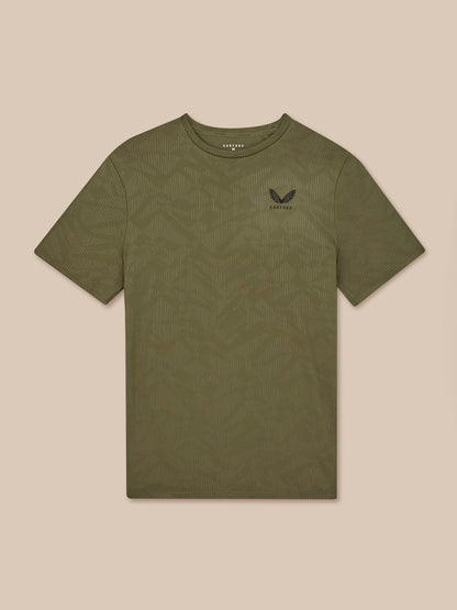 Green Castore Adapt All-Over Print Short Sleeve T Shirt front view with left chest logo and geometric pattern