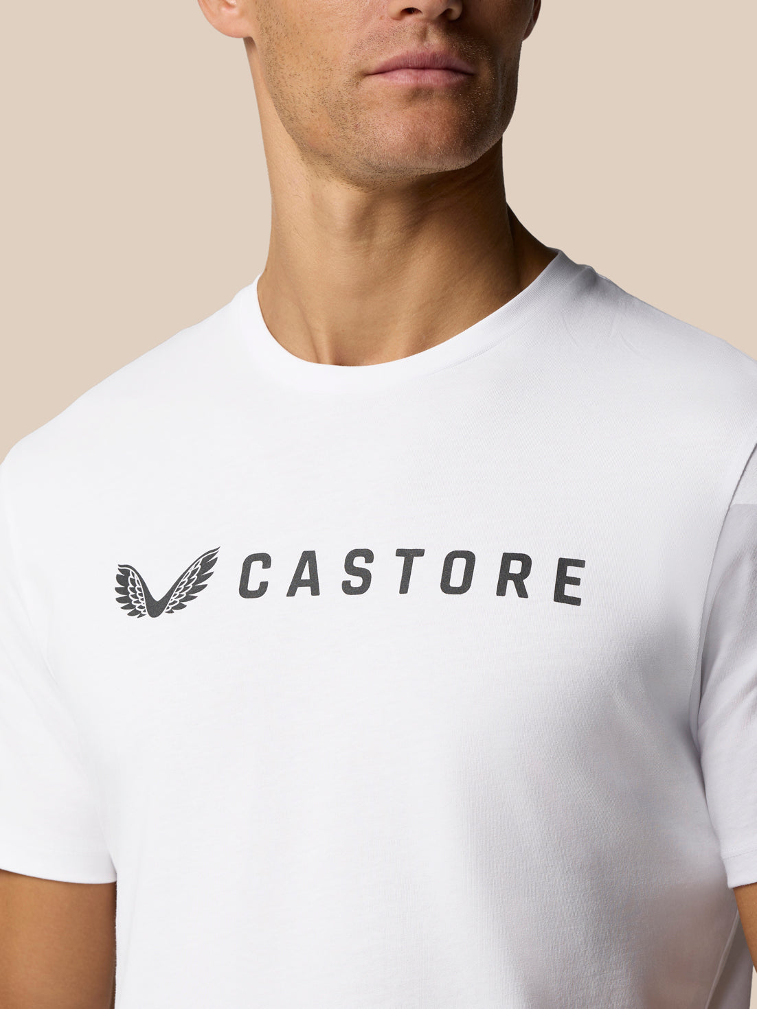 Close-up of a white Castore Graphic Lifestyle T-Shirt featuring the Castore wordmark on the chest