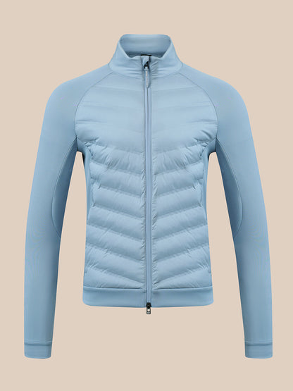 A light blue lightweight zip-up jacket with a stand-up collar and horizontal quilted puffer panels on the front, shown on a solid beige background.