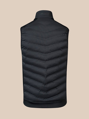 Back view of a black padded gilet with chevron quilting and stand collar