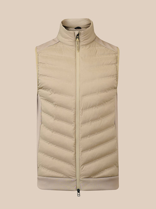 A sleeveless beige puffer vest with a high stand-up collar and front zipper, shown against a solid beige background.