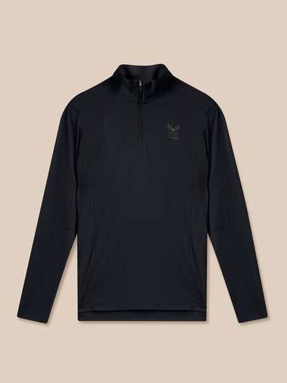 Black long-sleeve pullover with a small logo on a beige background