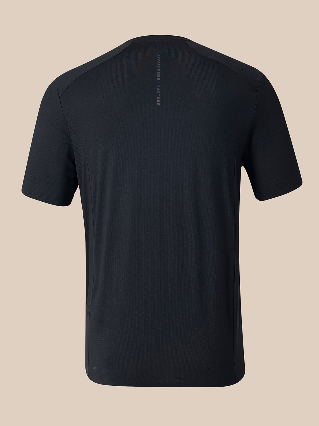A black short-sleeve athletic t-shirt shown from the back, featuring a subtle vertical logo on the upper back and a small logo near the lower hem, set against a solid beige background.
