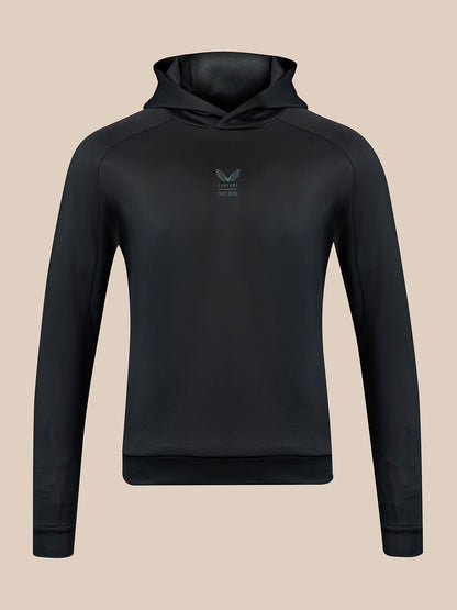 A black hooded sweatshirt shown from the back, featuring raglan sleeves and a ribbed hem and cuffs, displayed on a solid beige background.