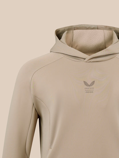 Upper chest of beige Reiss Flex Hoodie with hood and CASTORE REISS logo