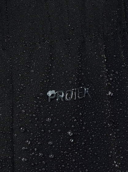 Close-up of a black waterproof fabric covered in water droplets, with a metallic 'PROTEK' logo in the center showing water beading on top.