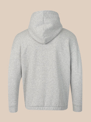 A light gray heathered hoodie shown from the back, featuring a simple stitched seam down the center back, ribbed cuffs, and a ribbed hem, set against a solid beige background.