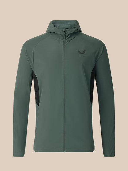 Dark green jacket on a beige background