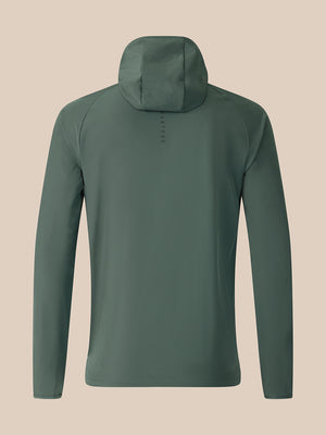 Dark green jacket on a beige background