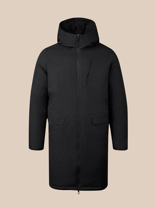 A black hooded winter parka jacket with a full front zipper, long sleeves, and two front flap pockets, shown against a solid beige background.