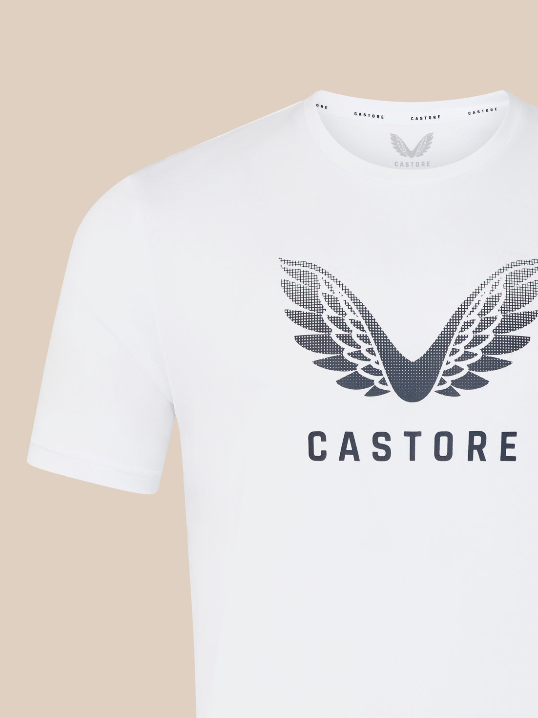 White men's Wings Graphic T Shirt featuring a large dark wing emblem and CASTORE branding