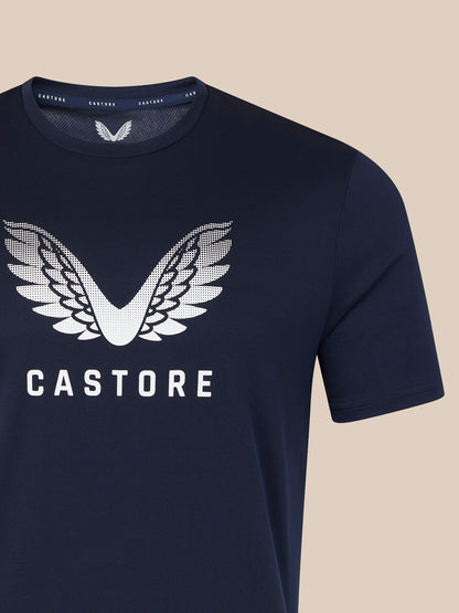 Navy men's Wings graphic T shirt close up of large white wings crest on navy fabric with CASTORE branding