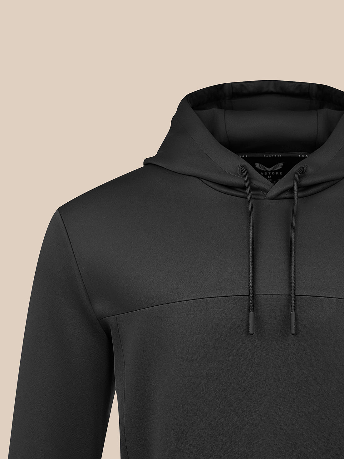 Close-up of black Men's Flex Hoodie highlighting hood and shoulder seam