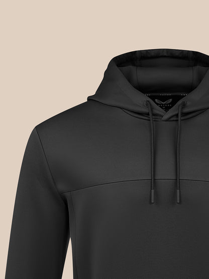 Close-up of black Men's Flex Hoodie highlighting hood and shoulder seam