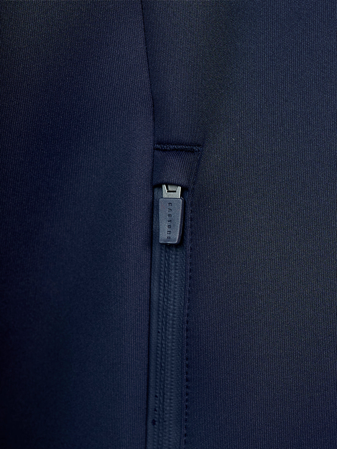 Close-up of navy fabric and zipper on the Men's Flex Hoodie.