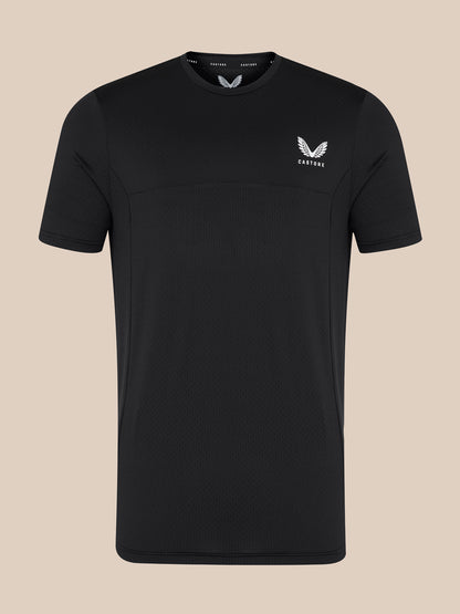 Black men's short sleeve training T shirt with small white Castore logo on left chest