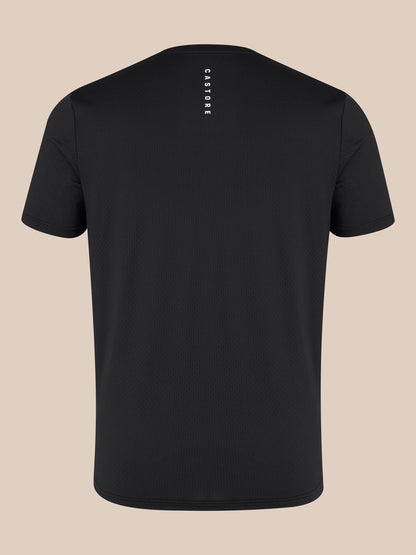 Back view of black men's short sleeve training T shirt showing vertical Castore branding on the upper back
