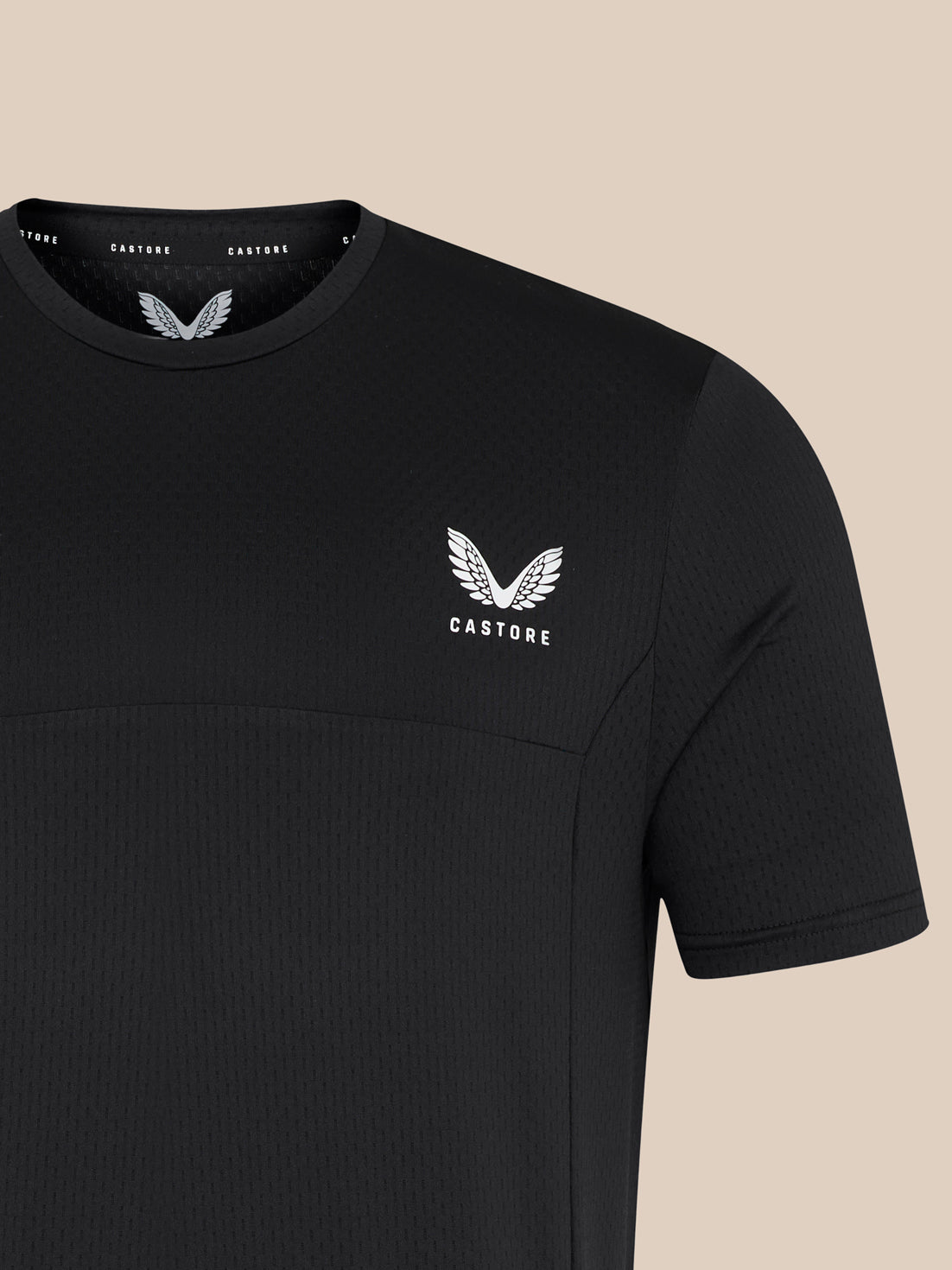 Black men's short sleeve training T-shirt with white winged Castore logo on chest.
