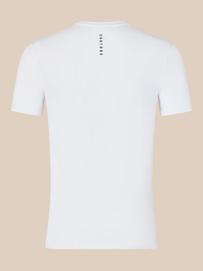 Back view of white men's training T shirt with vertical Castore branding along upper back