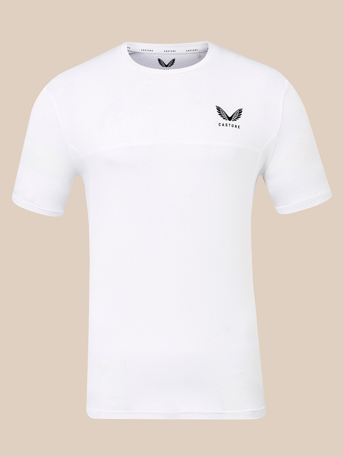A white short-sleeve athletic t-shirt with a black winged logo and the word 'CASTORE' printed on the left chest, displayed against a solid beige background.
