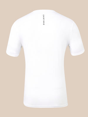 White short-sleeve athletic t-shirt shown from the back, featuring a vertical black 'CASTORE' logo printed on the upper back, set against a solid beige background.