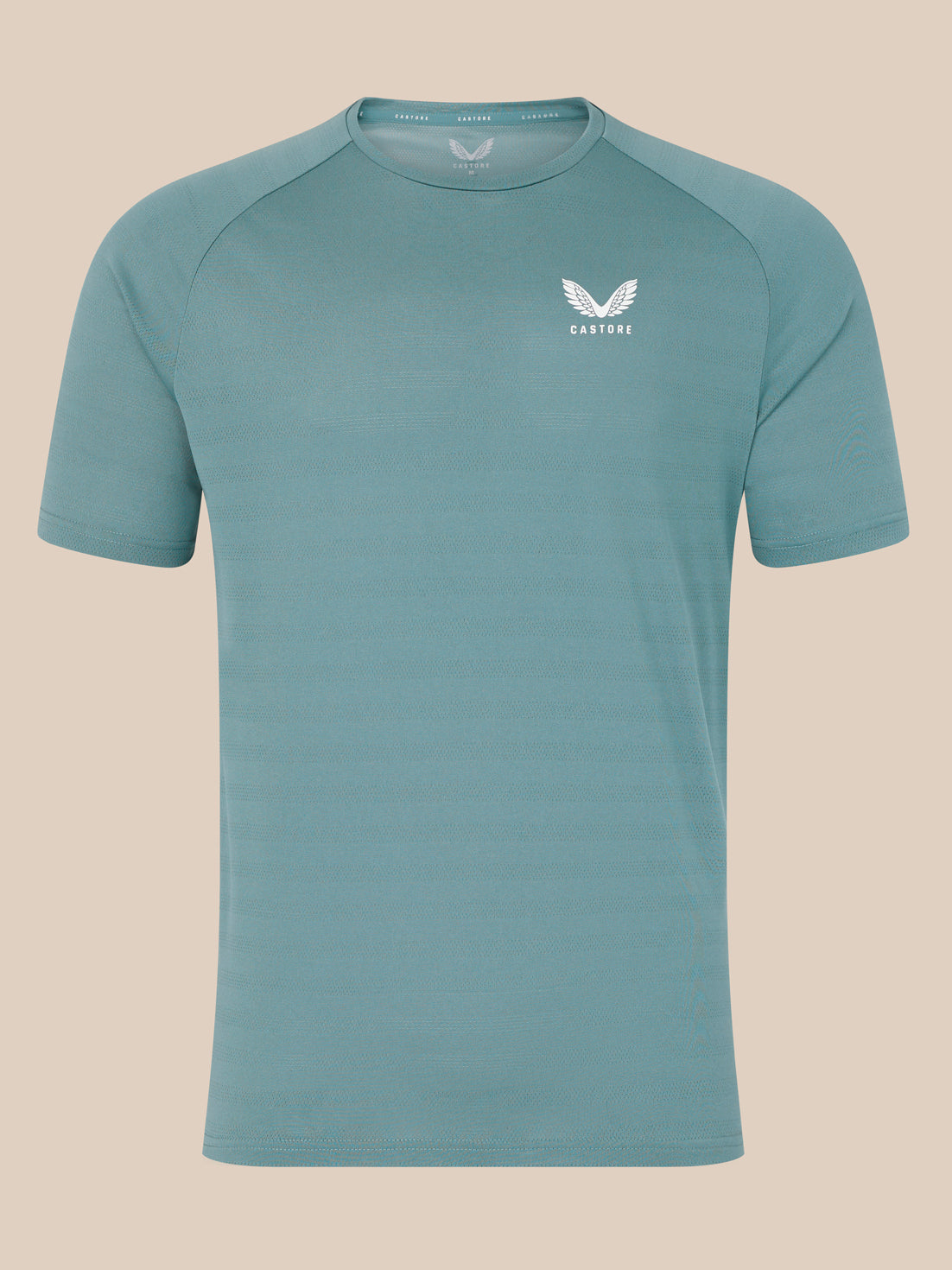 Blue short sleeve performance T shirt with a subtle textured pattern and a small white Castore logo on the chest.