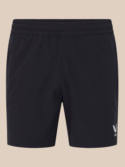 Back view of black 6 inch training shorts with an elastic waistband and a small white Castore logo at the lower right