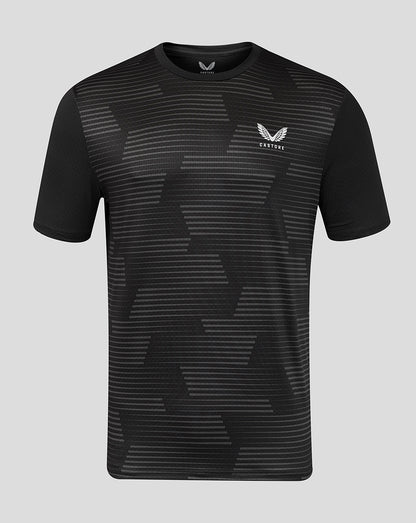 Front view of black men's all over print T shirt with geometric striped pattern and a small Castore logo on the chest