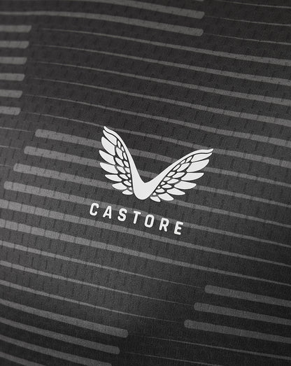 Close up of dark fabric with striped pattern and white Castore wing logo