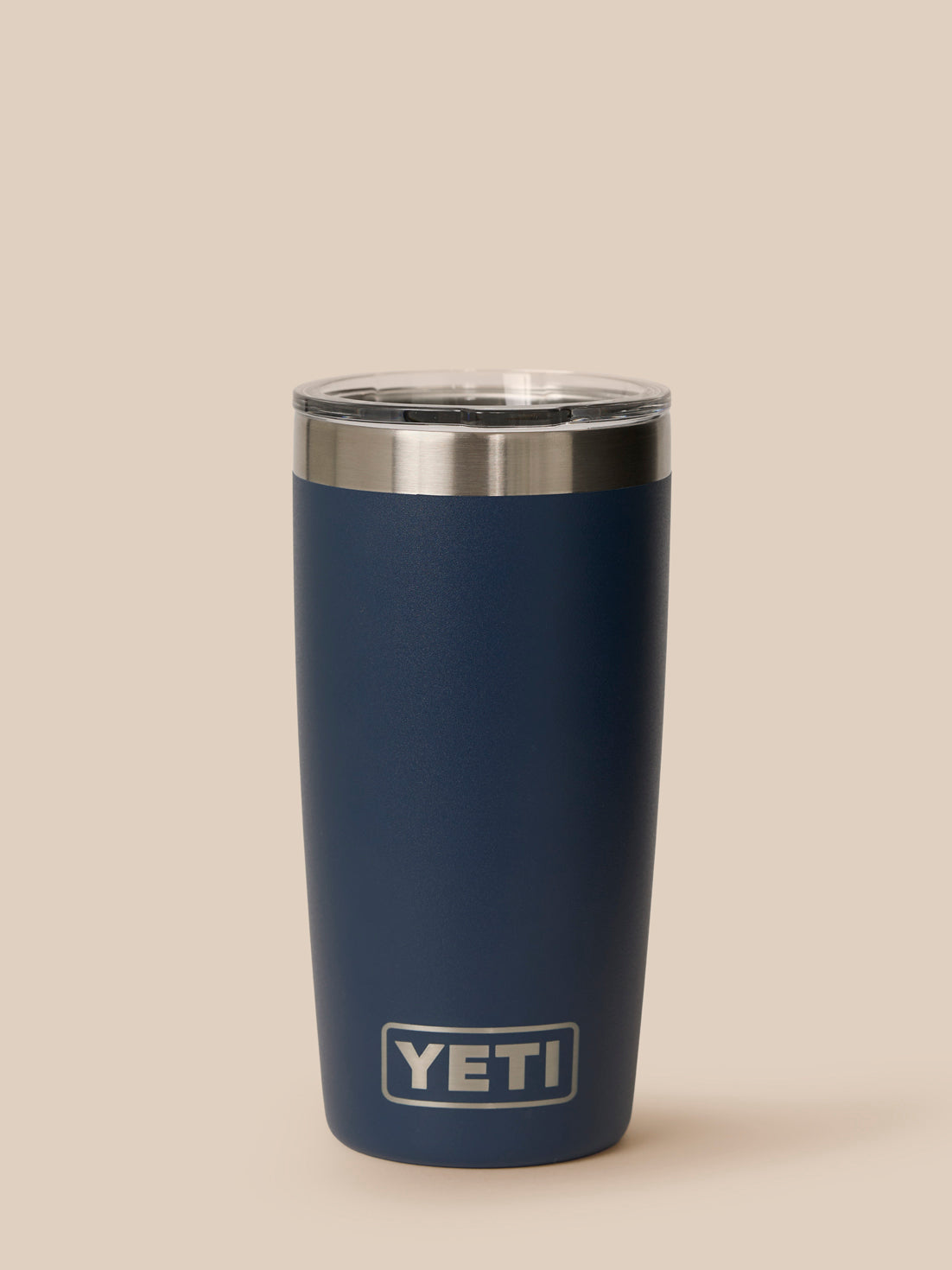 Front view of navy YETI Castore Tumbler 300ml with clear lid and YETI logo near the base