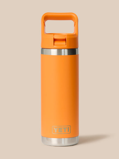 Orange YETI Rambler bottle viewed at an angle showing the cap handle and silver neck band