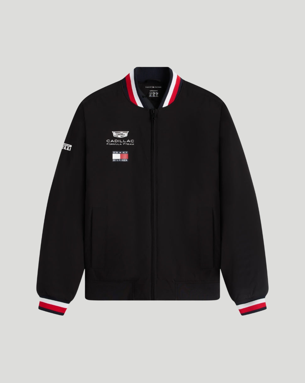 Black jacket with Cadillac logo on a gray background
