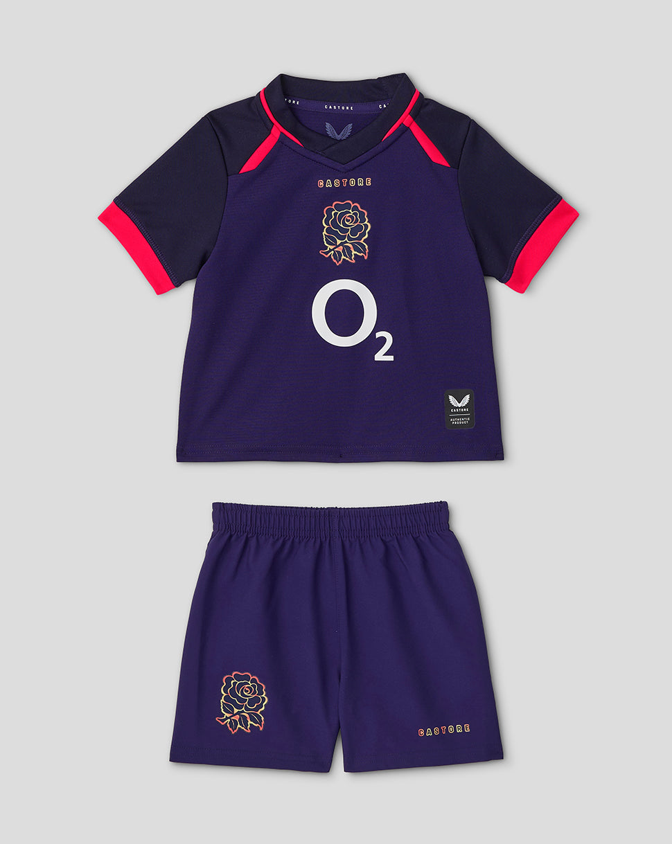 Navy sports outfit with red accents featuring a rose emblem and 'O2' logo on a gray background.