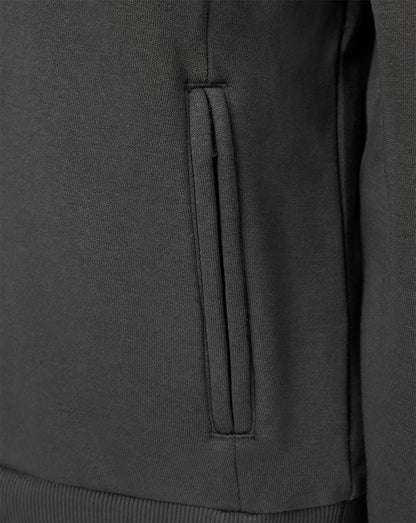 Close-up of a dark charcoal gray knit garment showing a vertical zippered pocket seam and ribbed hem.