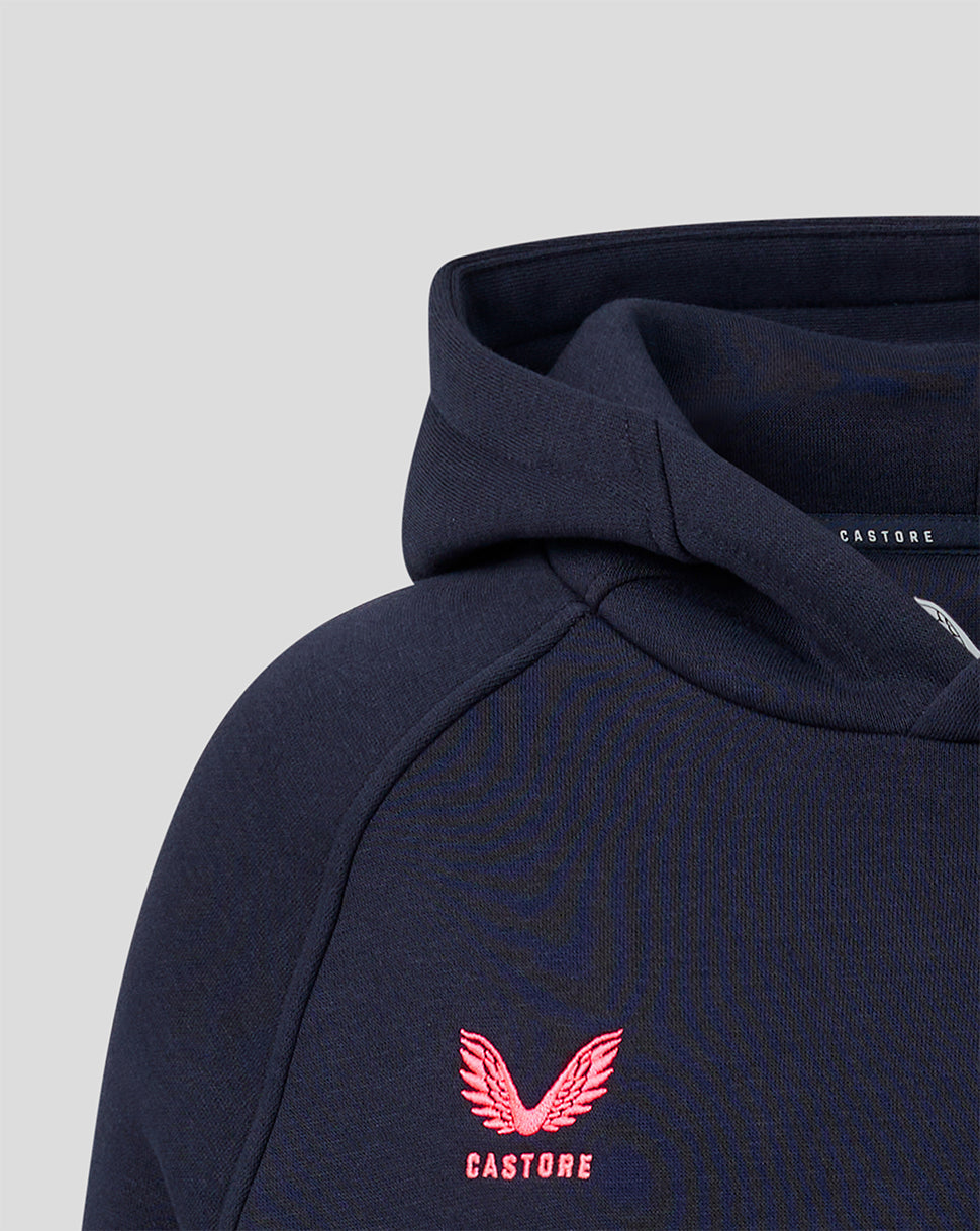 Close up of navy hoodie displaying pink Harlequins crest and Castore label at the neckline