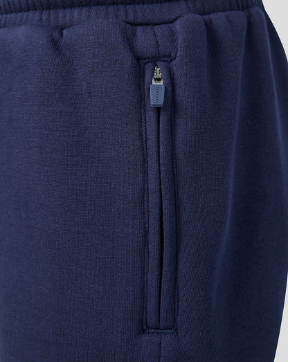 Navy blue sweatpants with a drawstring on a light gray background