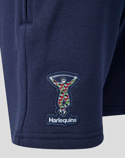 Navy blue shorts with Harlequins logo on a light gray background