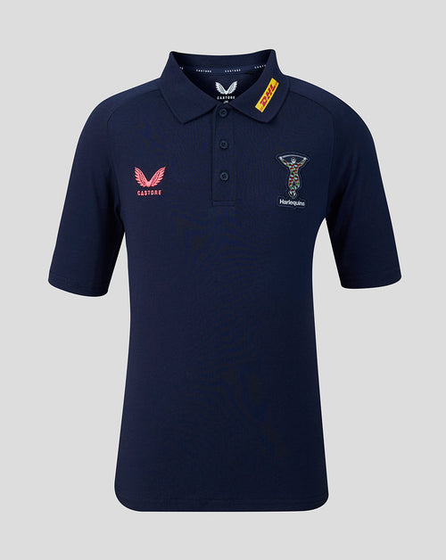 Navy blue polo shirt with brand logos on a light gray background