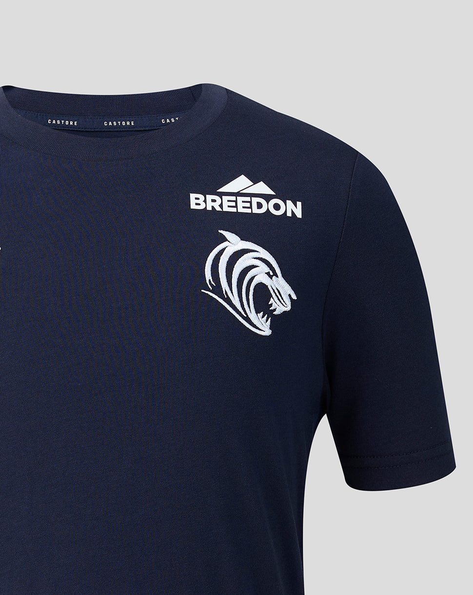 Close-up of navy Travel T-Shirt front showing Breedon logo tiger crest and Castore branding at collar