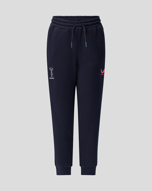 Navy Harlequins junior 2026/27 travel joggers with crest on thigh and Castore branding.