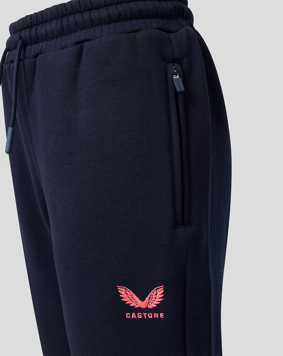 Navy Harlequins travel jogger side view showing zip pocket and pink Castore crest